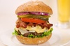 Hamburger loaded with two cheeses and bacon