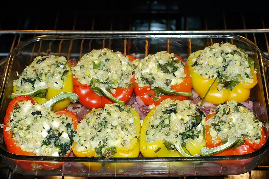 Yellow Peppers Stuffed with Quinoa, Corn and Feta Cheese