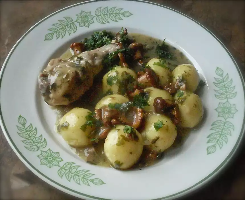 Chicken Drumstick in Chanterelle Sauce with steamed Potato Dumplings