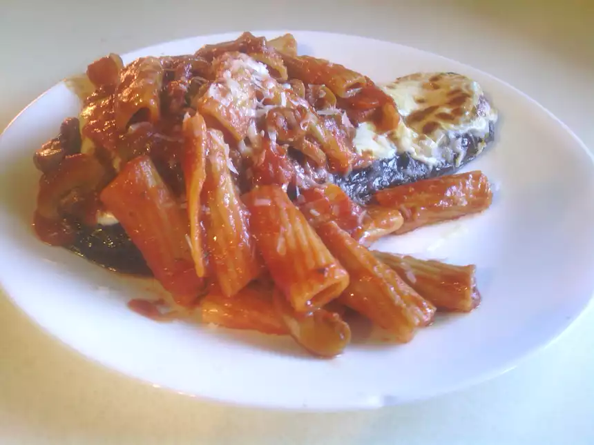 Rigatoni Pasta Over Eggplant Parmesan