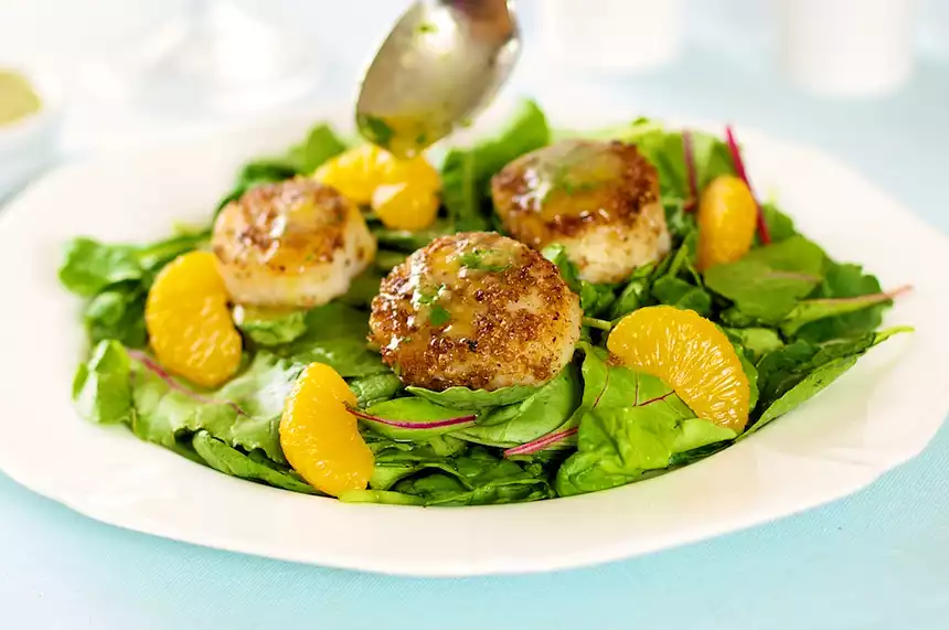 Coriander Spiced Scallops with Orange Ginger Dressing and Greens