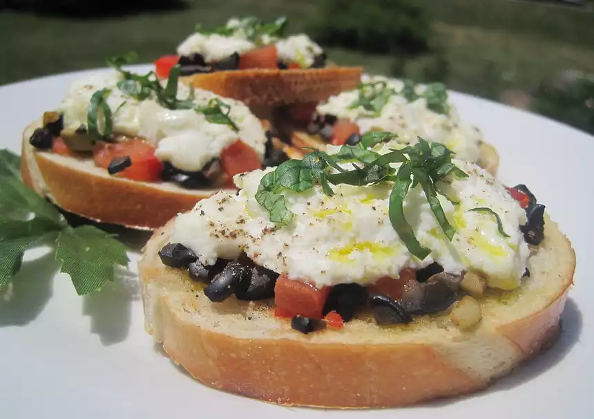 Tomato, Olive and Ricotta Crostini