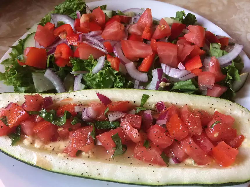 Bruschetta Hummus Stuffed Zucchini