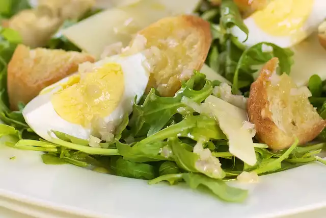 Arugula Salad with Garlic Croutons, Gruyere and Eggs