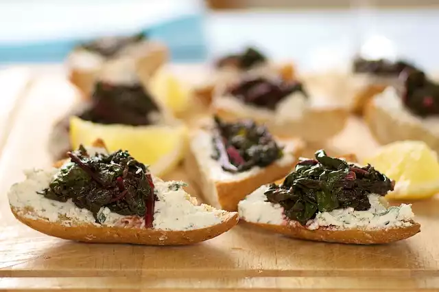 Sauteed Beet Greens and Herbed Goat Cheese Crostini 