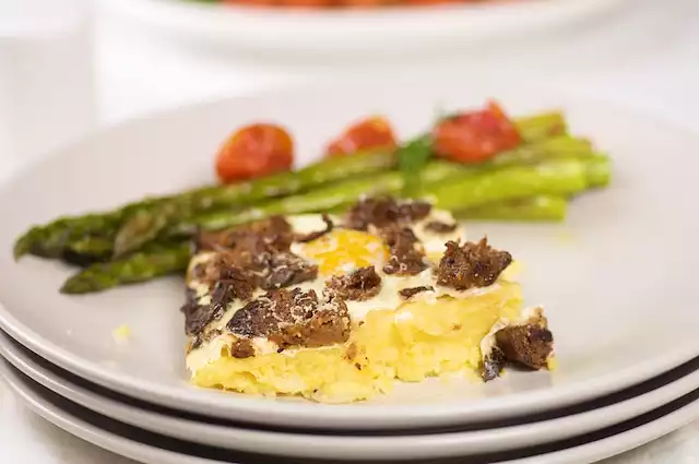 Baked Eggs and Sausage with Cheesy Polenta Casserole