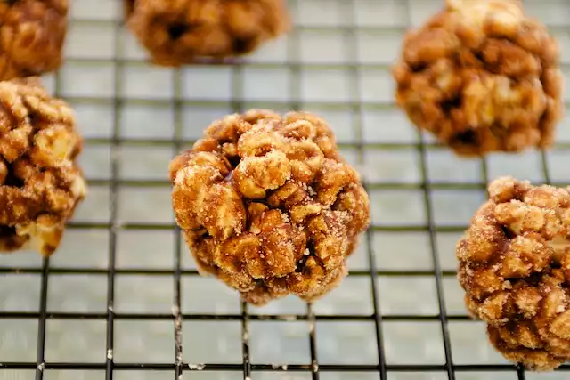 Mexican Chocolate and Spiced Christmas Popcorn Balls with Cinnamon Sugar